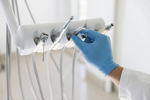 Professional Tooth Extraction technician working in Kingsville, TX